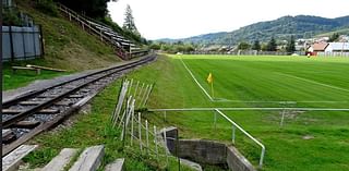 Pictured: Five of the most bizarre soccer stadiums in the world, from one in the UK with entrances inside a row of houses to one with a RAILWAY running through it