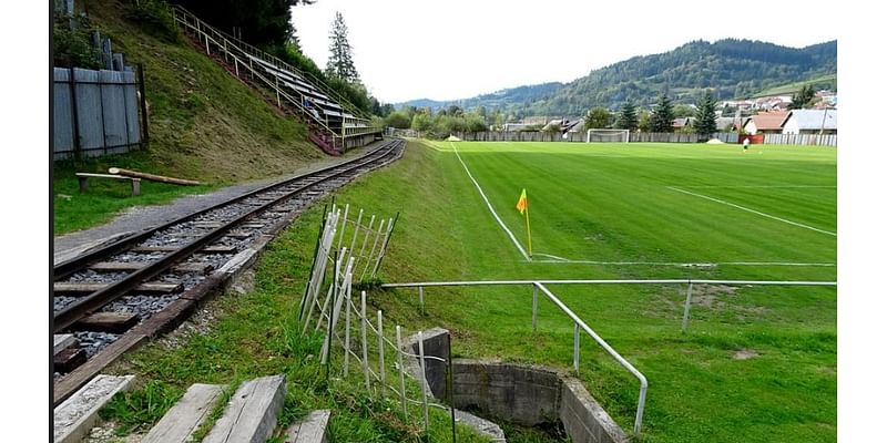 Pictured: Five of the most bizarre soccer stadiums in the world, from one in the UK with entrances inside a row of houses to one with a RAILWAY running through it