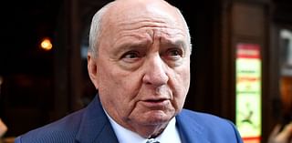 Alan Jones is arrested in his luxury apartment