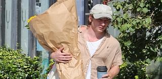 Jeremy Allen White plays the role of doting dad as he pulls his two young daughters in a wagon at Studio City Farmers Market... after debuting new romance