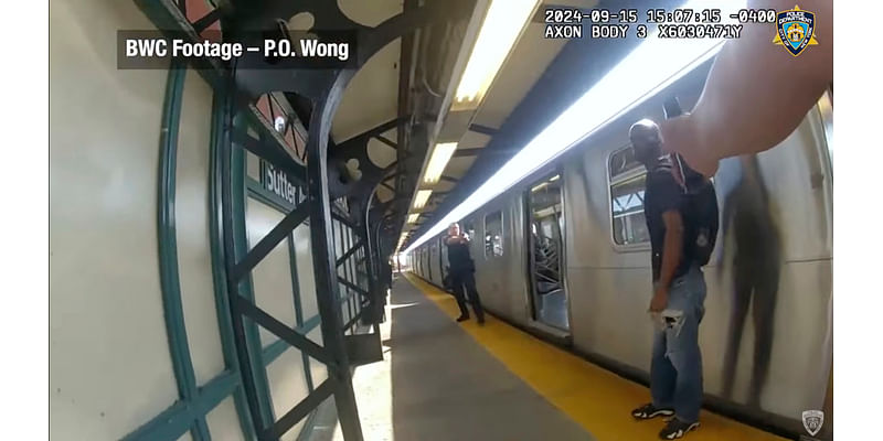 Footage shows NYPD officers firing at man with knife in subway shooting that wounded 4