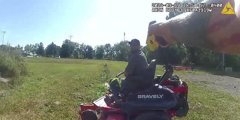 VIDEO: Man on lawnmower aims gun at police, is tased, shoots his own hand