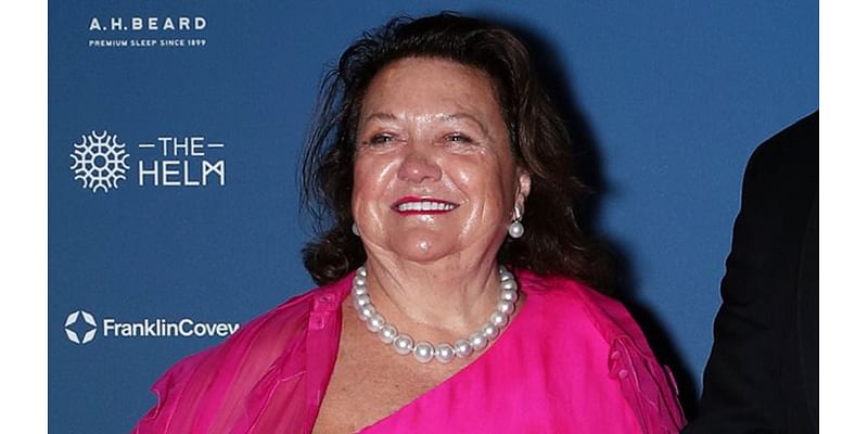 Gina Rinehart ensures all eyes are on her as she steps out in a stunning fuchsia gown at the 2024 Executive of the Year Awards in Sydney