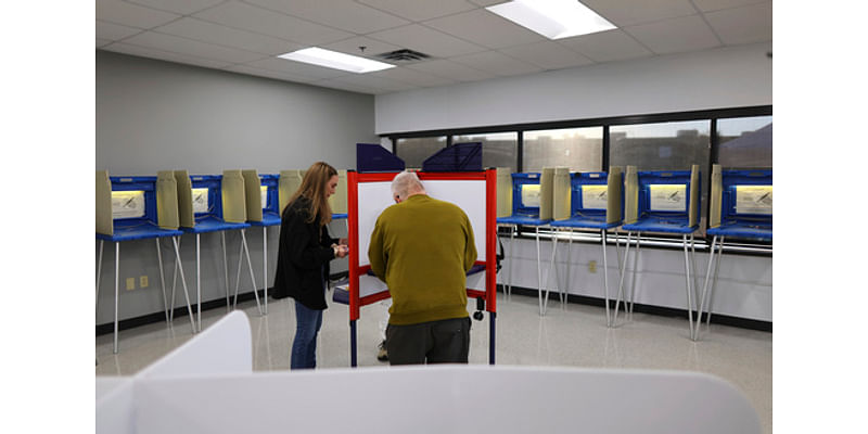 In-person voting begins for the US presidential contest, kicking off the sprint to Election Day