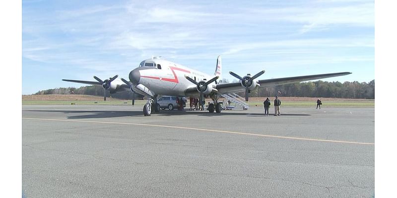 Historic aircraft delivers toys for children in Asheville impacted by Helene