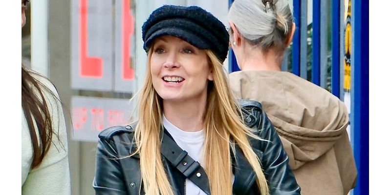 Downton Abbey star Joanne Froggatt shows she is not too posh to push as she takes her newborn baby for a stroll after giving birth earlier this month