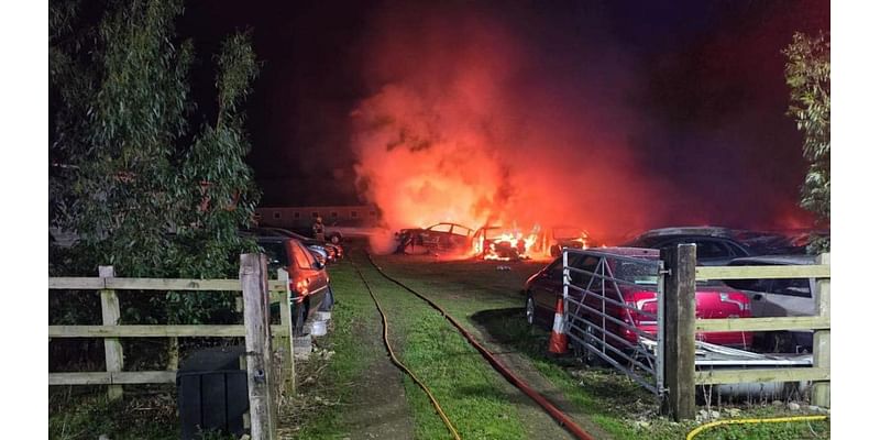 Crews tackle car fire including 20 vehicles