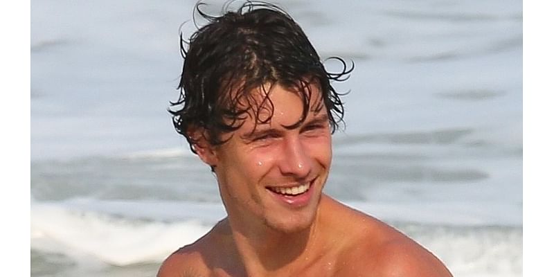 Shawn Mendes shows off fit physique as he goes shirtless for beach day in Brazil ahead of Rock In Rio concert