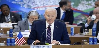 Biden calls climate change the 'existential issue humanity faces' as Kremlin accuses him of pushing world to brink of WWIII