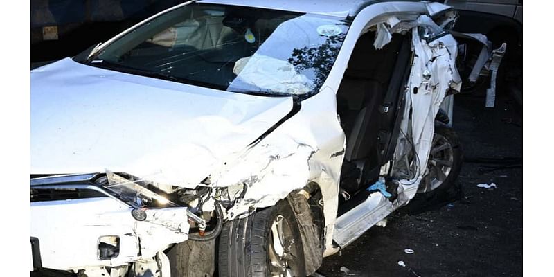 Terrifying moment banned driver smashes into innocent motorist as he tries to evade chasing police - leaving victim needing surgery for serious facial injuries