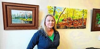 Artist exhibits paintings at library