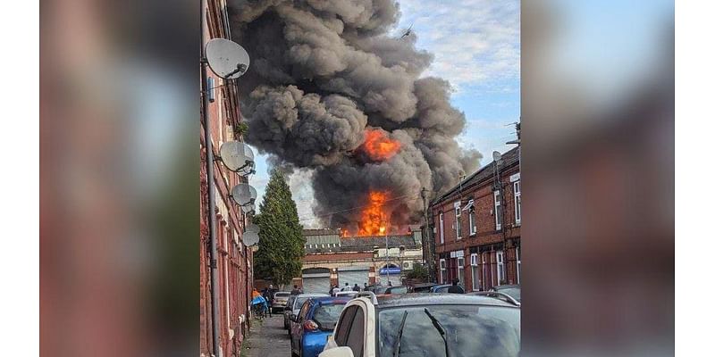 Crews tackle fire that led to huge plumes of smoke