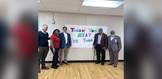 AT&T distributes 100 laptops at West Broad Street YMCA