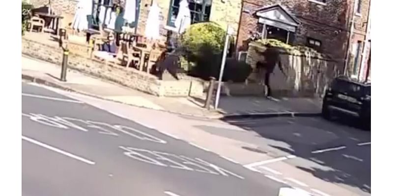 Moment pensioner is mugged outside pub 'for his Rolex and phone' by two masked men who stormed into beer garden during the afternoon