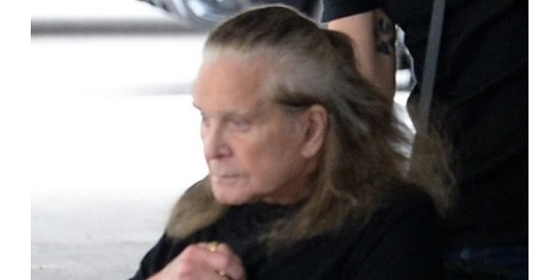 Ozzy Osbourne looks frail in LA with wife Sharon - after she said his health has delayed their move to England