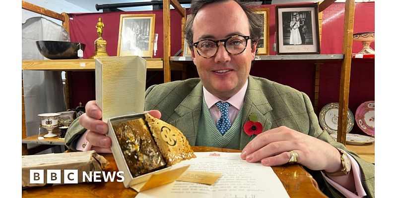 Queen Elizabeth's wedding cake slice sells for £2,200 at auction