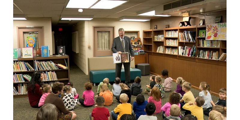 Mayor Joe Schember stops at Saint James School to read to students