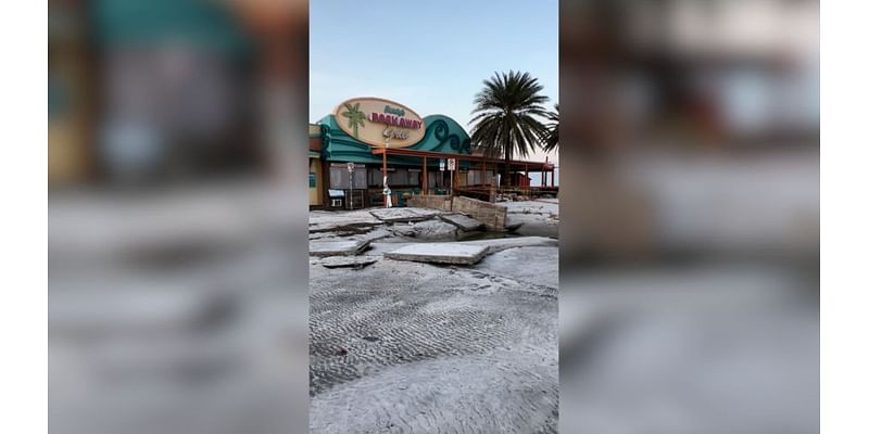 Clearwater Beach businesses cleaning up from sand and storm surge, visitors urged to stay away