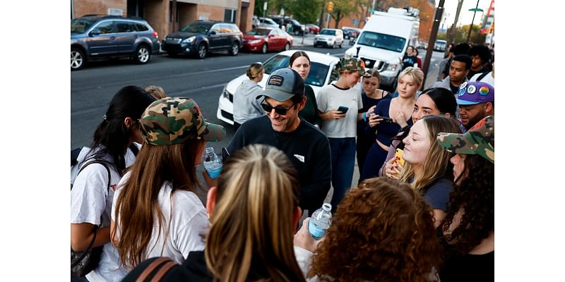 Actor Paul Rudd hands out water to voters at Pa. universities