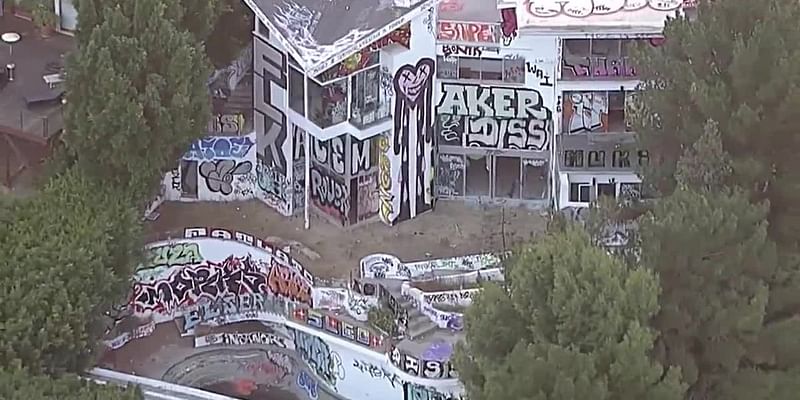 Abandoned Hollywood Hills mansion covered in graffiti as squatters take over the property