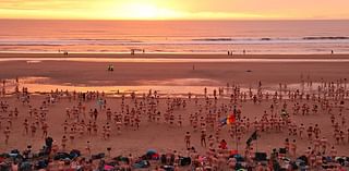 Nude awakening! 1,200 brave skinny dippers dash into the freezing North Sea for charity