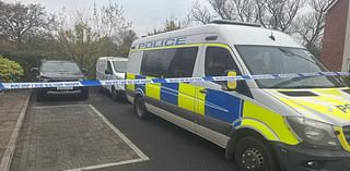 Police divers search muddy stream where mystery body was discovered next to quiet modern Bristol estate