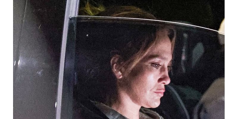 Jennifer Lopez looks tense as she checks her phone while cruising through LA after returning from Saudi Arabia