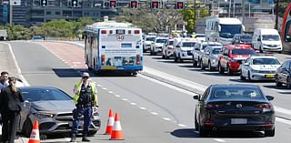 Motorcyclist arrested on Sydney Harbour Bridge after fatal crash allegedly hit a cop while speeding away from police