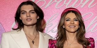 Elizabeth Hurley and her lookalike son Damian wear matching low-cut outfits as they lead arrivals at Crown Oaks Club Lunch at Crown Palladium in Melbourne