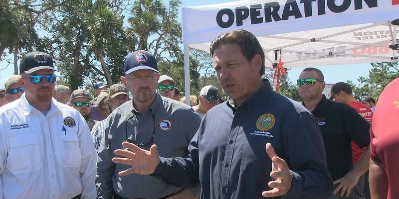 Governor DeSantis talks about hurricane recovery and hands out food in Suwannee